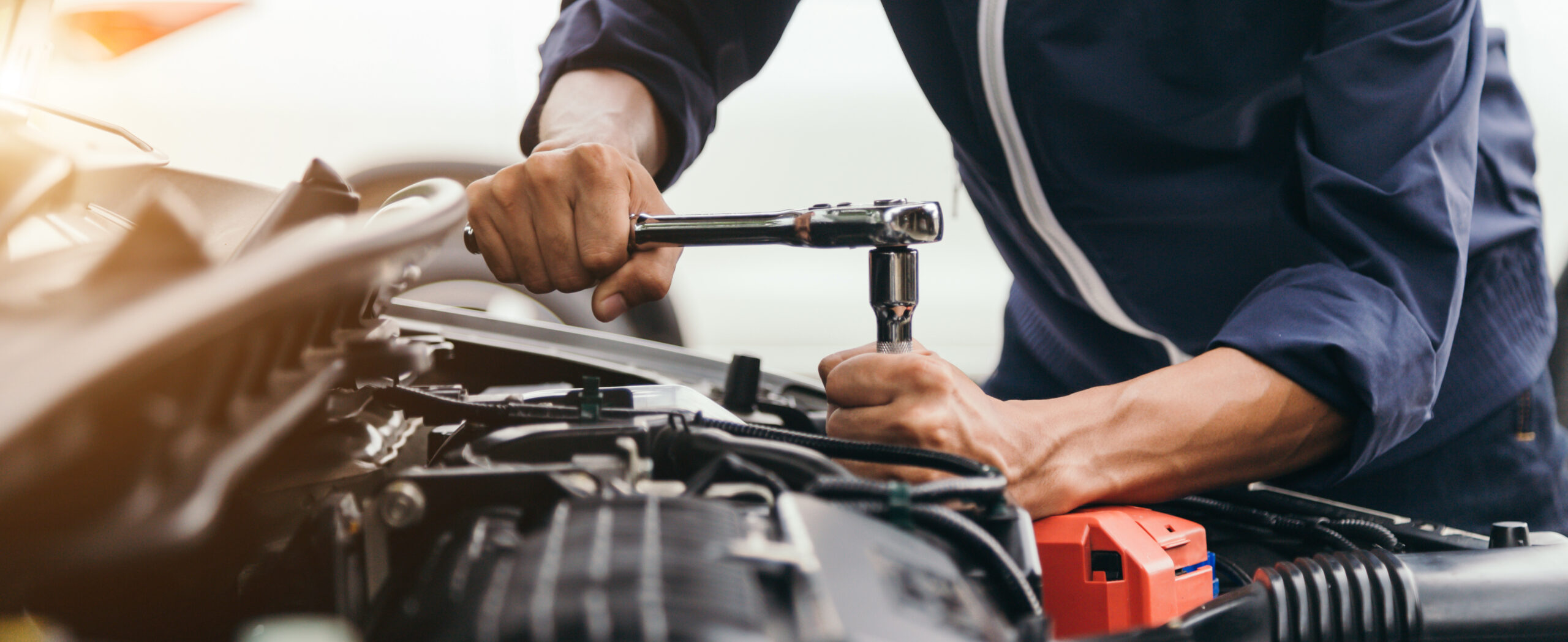 man working on engine